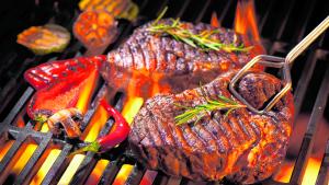 Beef steaks on the grill