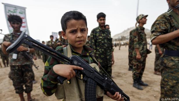 Schätzungen zufolge werden bis zu 250.000 Kinder als Soldaten missbraucht