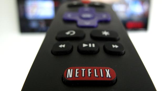 FILE PHOTO: The Netflix logo is pictured on a television remote in this illustration photograph taken in Encinitas, California