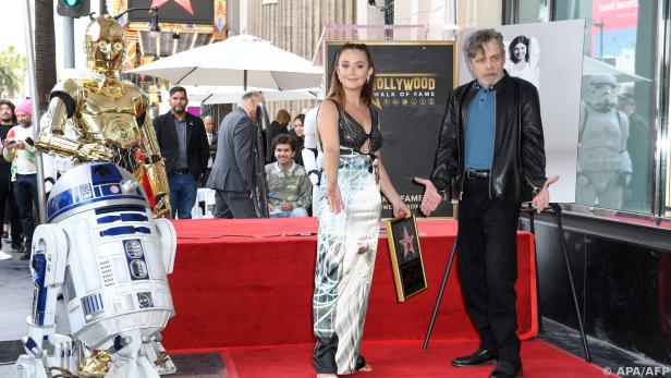 C-3PO, R2D2, Billie Lourd und Mark Hamill beim Stern